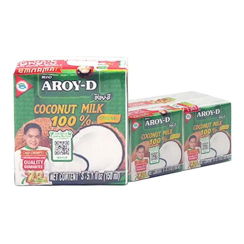 Aroy-D Coconut Milk 150ml bottles arranged in a pack, showcasing the Thai brand's dry grocery coconut milk product.