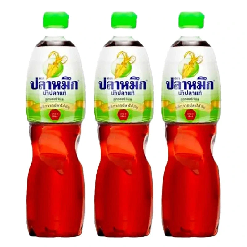 Three 700ml bottles of Squid Brand Fish Sauce in clear plastic bottles with red caps, labeled as dry grocery.