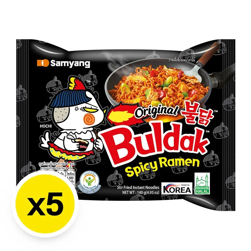 Samyang Ramen Hot Chicken 140g pack, dry grocery, featuring spicy ramen noodles in a black bowl with seasoning packets.