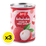 Cans of ARO Lychee in syrup, 565g each, stacked in a grocery store display, showcasing the product labels and packaging.