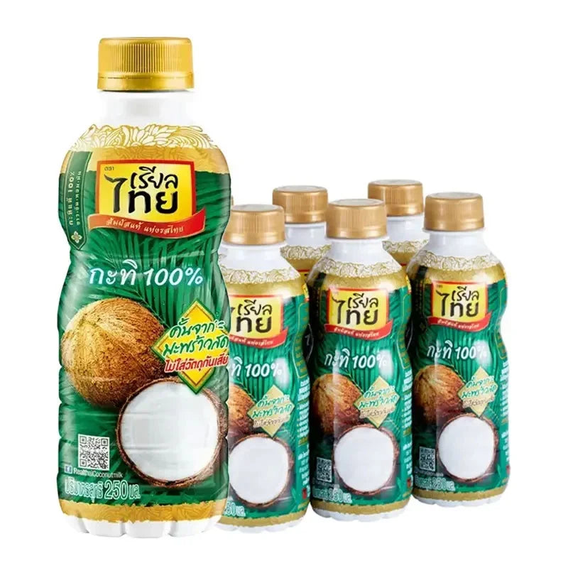 Real Thai Coconut Milk PET bottle, 250ml, showing the label and packaging for dry grocery coconut milk product.