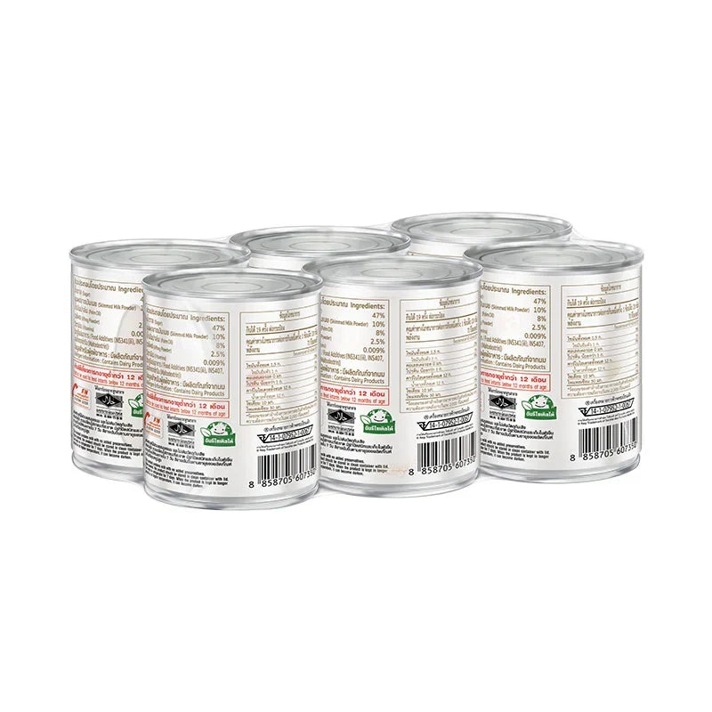 Six cans of Carnation Plus Sweetened Condensed Milk, 380g each, stacked in a display, perfect for baking and dessert recipes.
