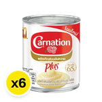 CARNATION Carnation Plus Sweetened Condensed Milk 380g can, stacked in six-pack, in a shopping basket or on store shelf.