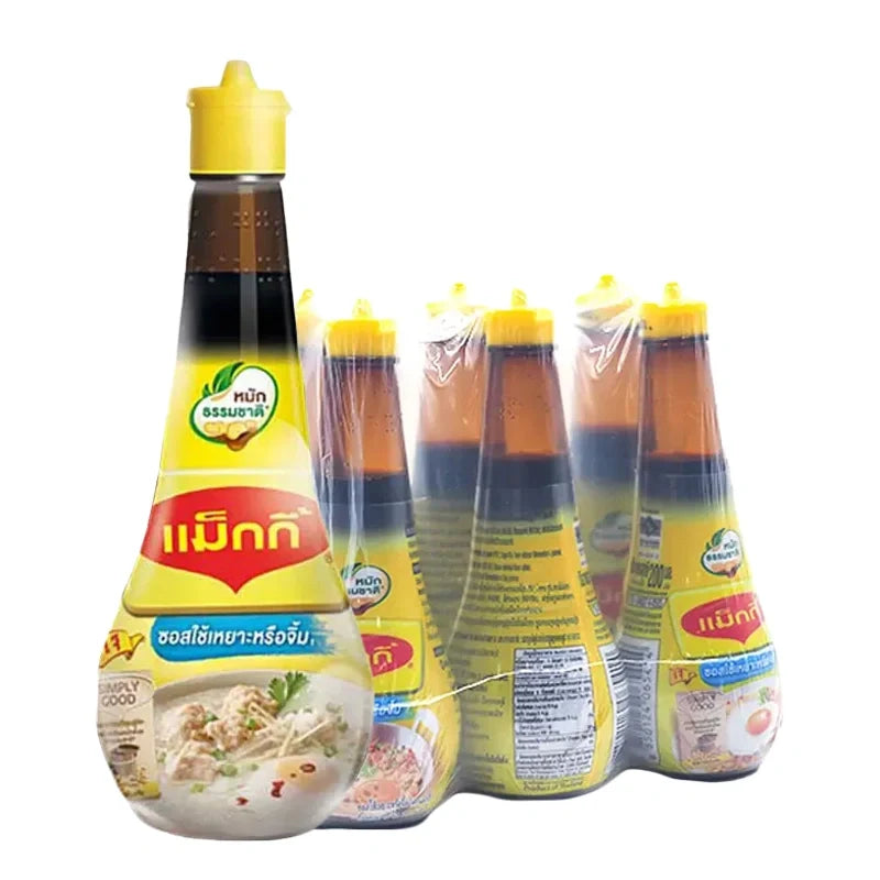 Six bottles of MAGGI seasoning sauce 200ml each, displayed in a row, showing the dark liquid inside clear glass bottles.