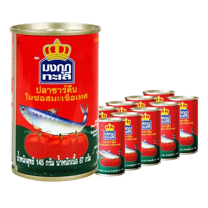 Cans of Mongkut Talay Sardines in Tomato Sauce, 145g each, arranged in a row, showing the product labels and packaging.