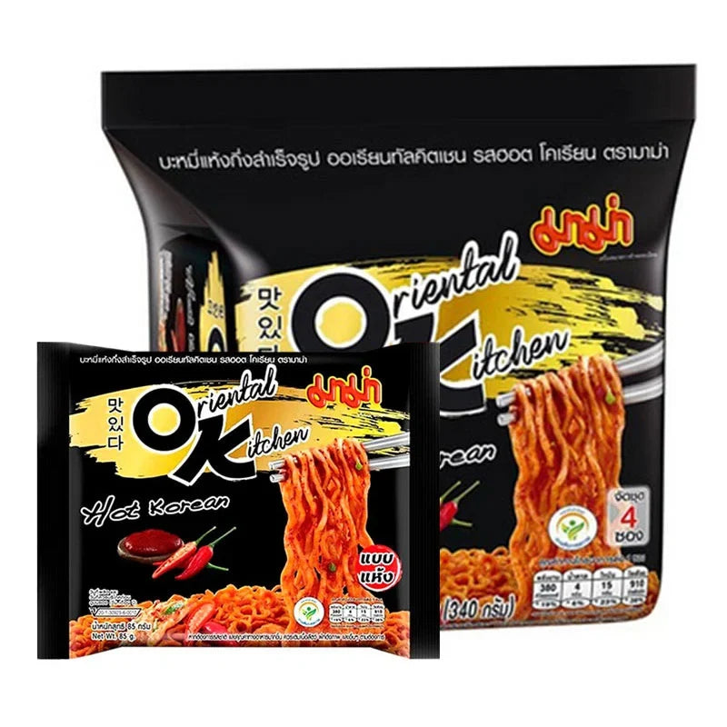 Pack of four Mama Oriental Kitchen Hot Korean instant noodles, 85g each, in dry grocery packaging with spicy flavor.