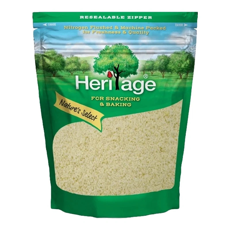 Heritage Raw Powder Almond in 500g package, dry grocery product, close-up of the almond powder in a clear container.