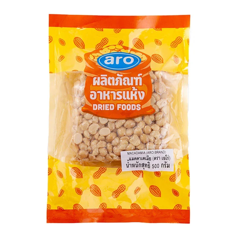 ARO Macadamia nuts 500g in a clear plastic bag, shown in a close-up image with visible brown nuts and textured shells.