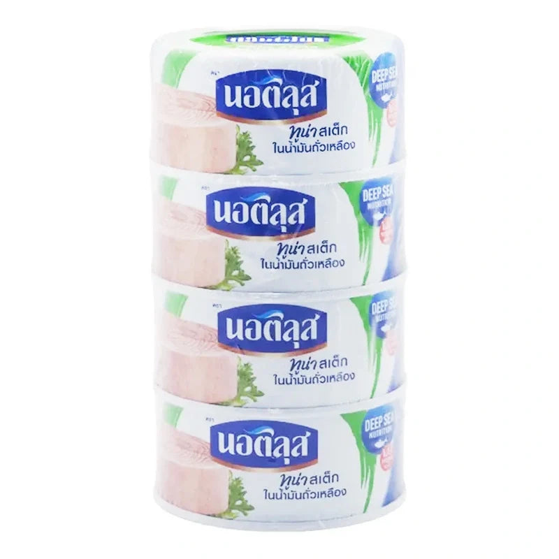 Cans of Nautilus Tuna Steak in soybean oil, 170g each, stacked in a package for dry grocery shopping.