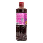 A bottle of ARO Sukishi Korean Style BBQ Sauce 590g, with Korean-inspired flavor, on a grocery store shelf.