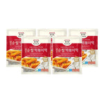 Jongga small rice cakes 1kg pack, dry grocery product, showing stacked rice cake slices in a clear package.