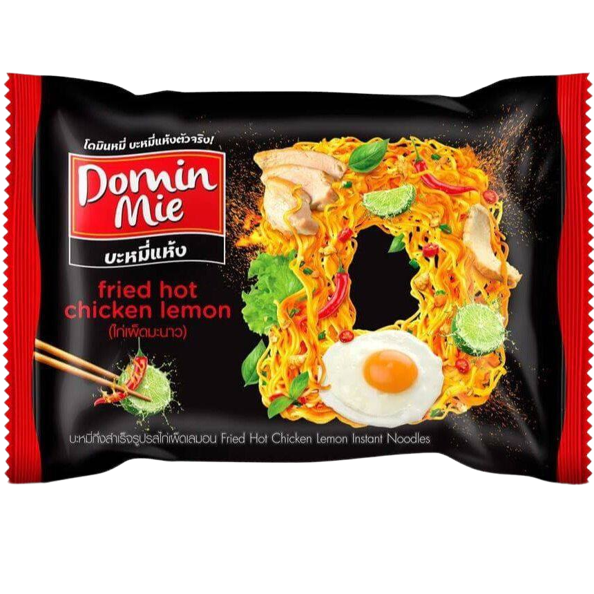 Domin Mie Fried Instant Noodles Hot Chicken Lemon flavor in a prepared bowl with noodles, chicken, lemon slices, and garnishes.