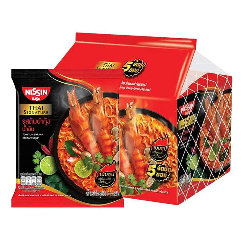 Nissin Thai Signature Tom Yum Kung Creamy Instant Noodles in 72g dry grocery package with noodles and seasoning packet.