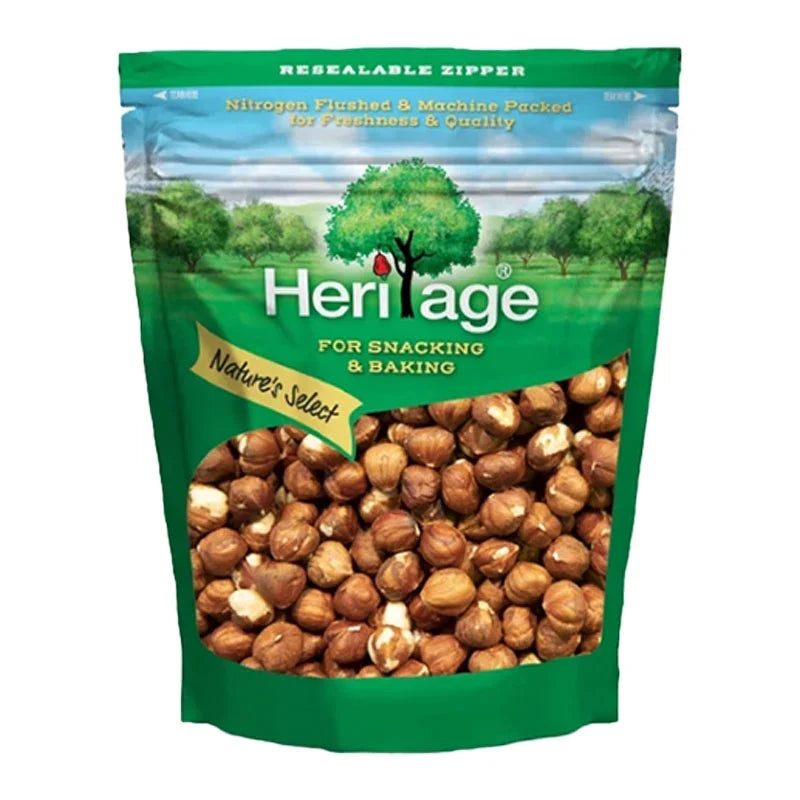 Heritage Hazelnuts 500g in a clear transparent bag, showing shiny, whole hazelnuts ready for snacking or baking.
