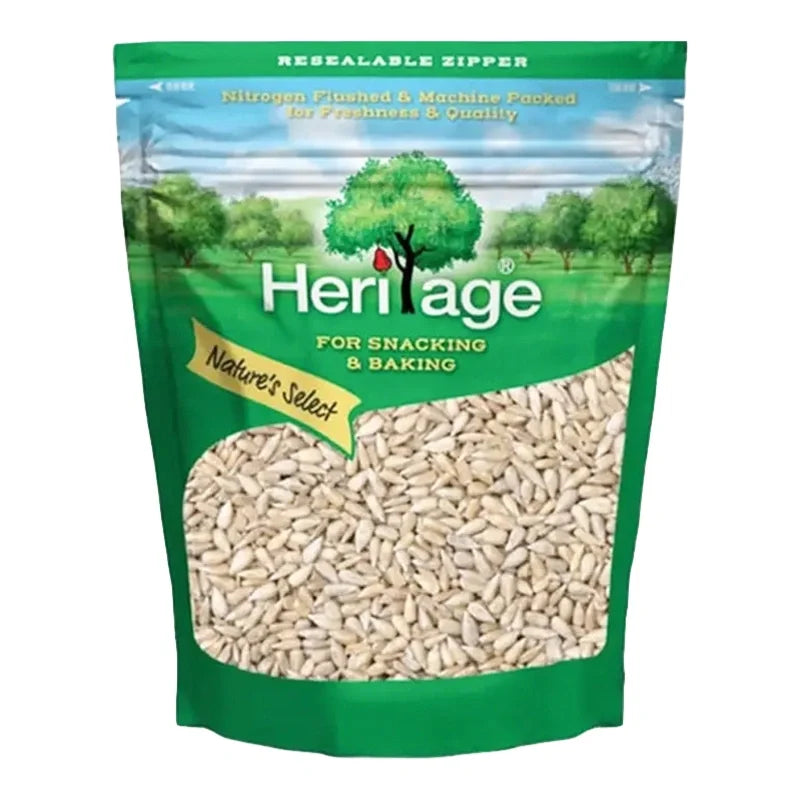 Heritage Dry Roasted Sunflower Seeds 500g in a clear plastic bag, showing golden sunflower seeds ready for snacking.