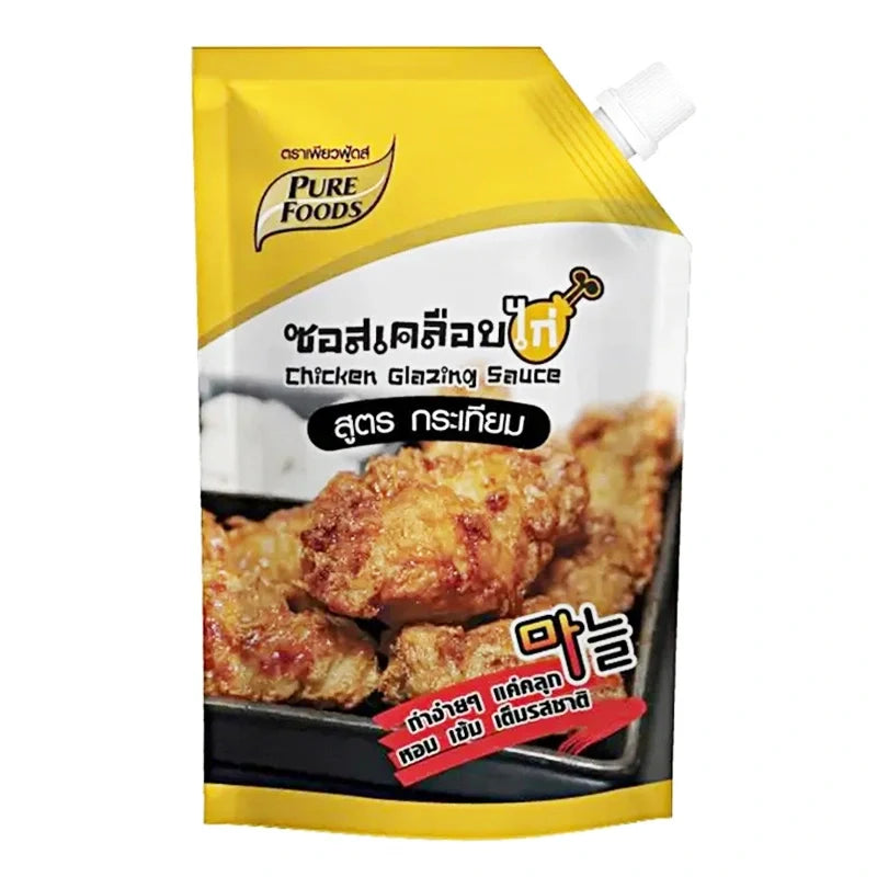 Pure Foods Chicken Sauce Garlic Flavor 1kg in a clear jar, showcasing the garlic-infused chicken sauce for cooking or marinating.