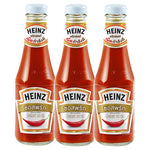 Heinz Chili Sauce 300g bottles, three-pack, in clear glass bottles with red caps, labeled with Heinz branding and chili graphics.
