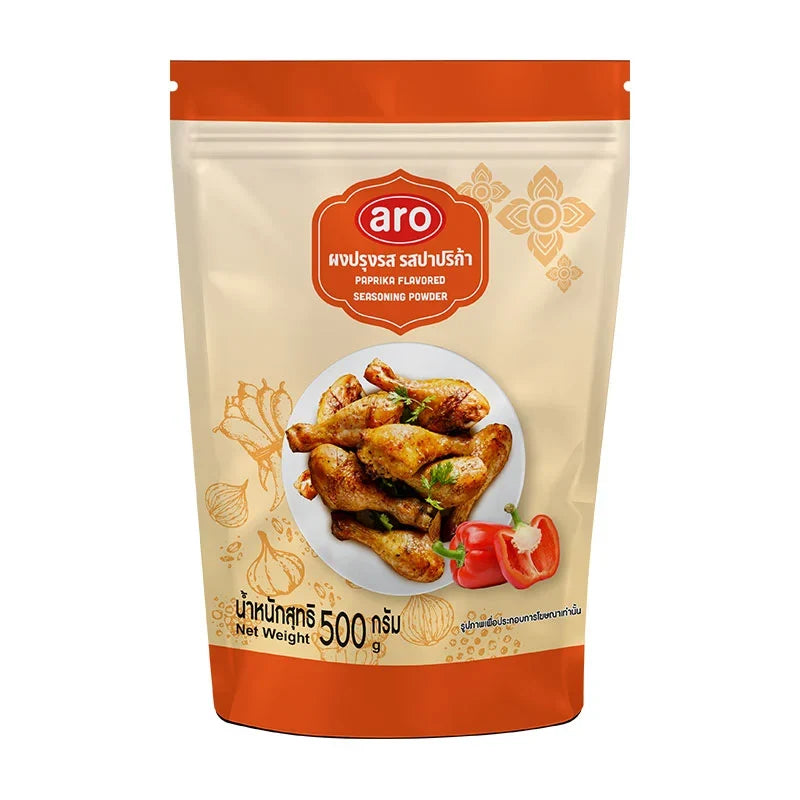 A jar of ARO paprika seasoning powder in a 500g container, showing vibrant red paprika spice for cooking and flavoring.