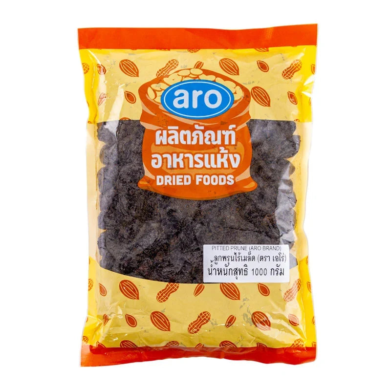 ARO Pitted Prune 1kg in a clear bag, showing dark, dried prunes ready for snacking or cooking.