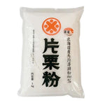 Maeda Katakuriko potato starch flour in three 1kg bags, dry grocery product, white powder used for cooking and thickening.
