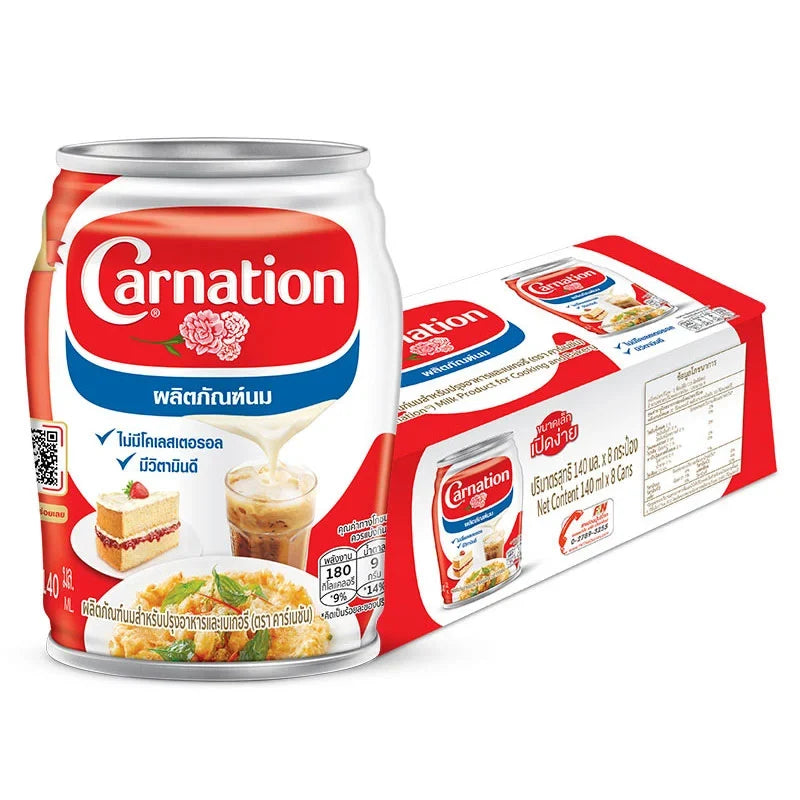 Carnation evaporated milk 140ml cans, 8-pack, in a dry grocery product image showing the cans stacked together.