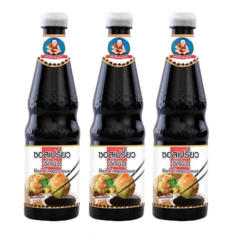 DEK SOM Boon Black Vinegar 600ml bottles, dry grocery product, black vinegar with clear labels in a row.