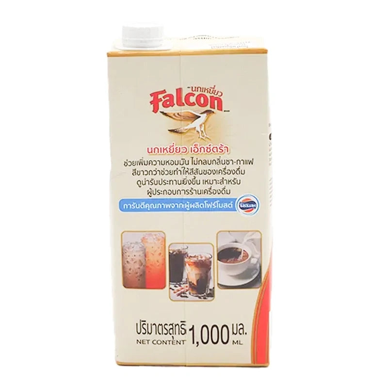 Falcon Extra Evaporated Creamer 1L bottle of dry grocery product with label visible and cap on.