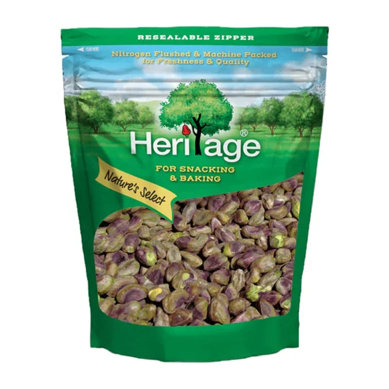 Heritage Raw Pistachios in 250g package, dry grocery product, showing fresh, shelled pistachios in a clear container.