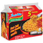 Indomie Red Chili Fried Noodles in a bowl with red chili flakes and garnishes, showcasing the spicy noodle dish.