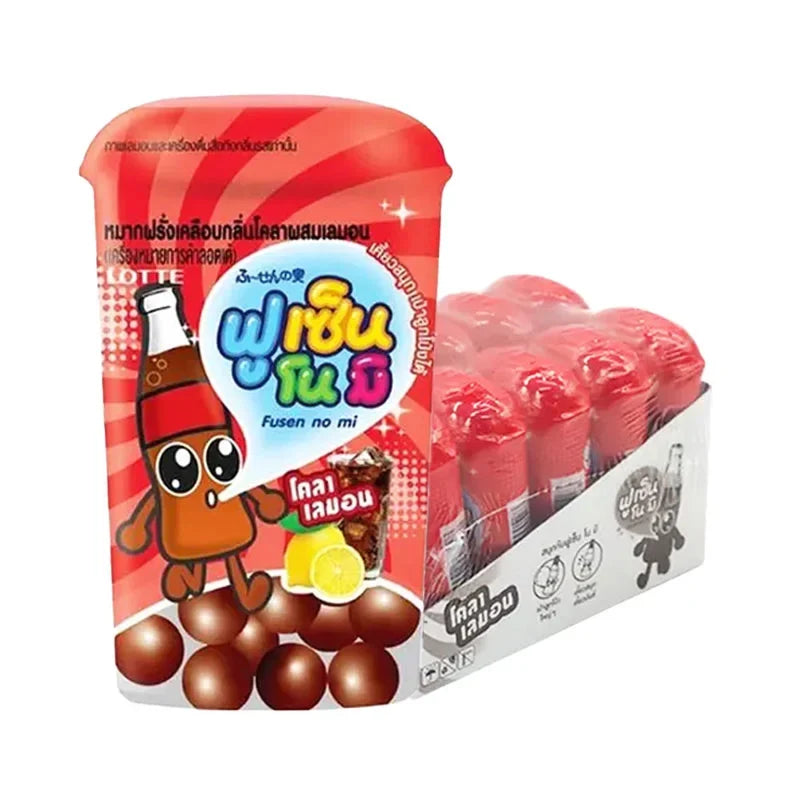 Lotte Gum Fusen Cola candies in 15g packs, colorful chewy confectionery from LOTTE, stacked in a display bowl.