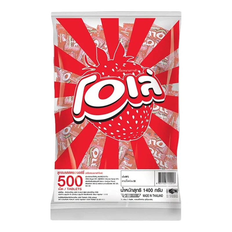 OLE Candy Strawberry dry grocery snack featuring bright red strawberry-flavored confectionery pieces in colorful packaging.