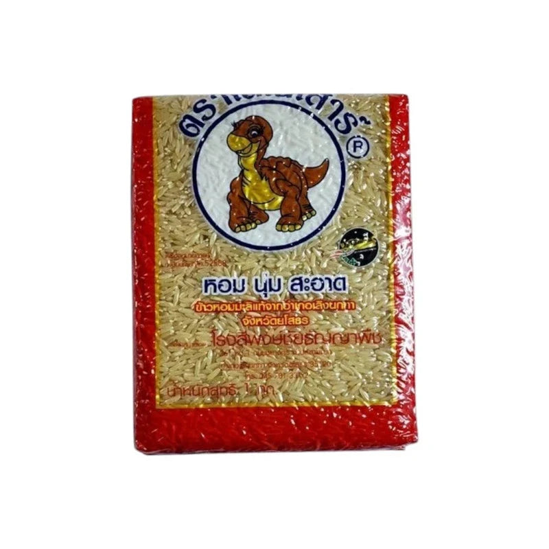 Dinosaur Rice Brown 1kg dry grocery packaging showing a bag of brown rice with Dinosaur Rice branding.