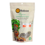 Close-up of BABOO Baboo Chia Seeds in a clear glass jar, showing small black and white chia seeds on a white background.
