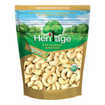 Heritage Organic Raw Broken Cashew Nuts in 250g bag, dry grocery product with visible broken cashew pieces and natural nut appearance.