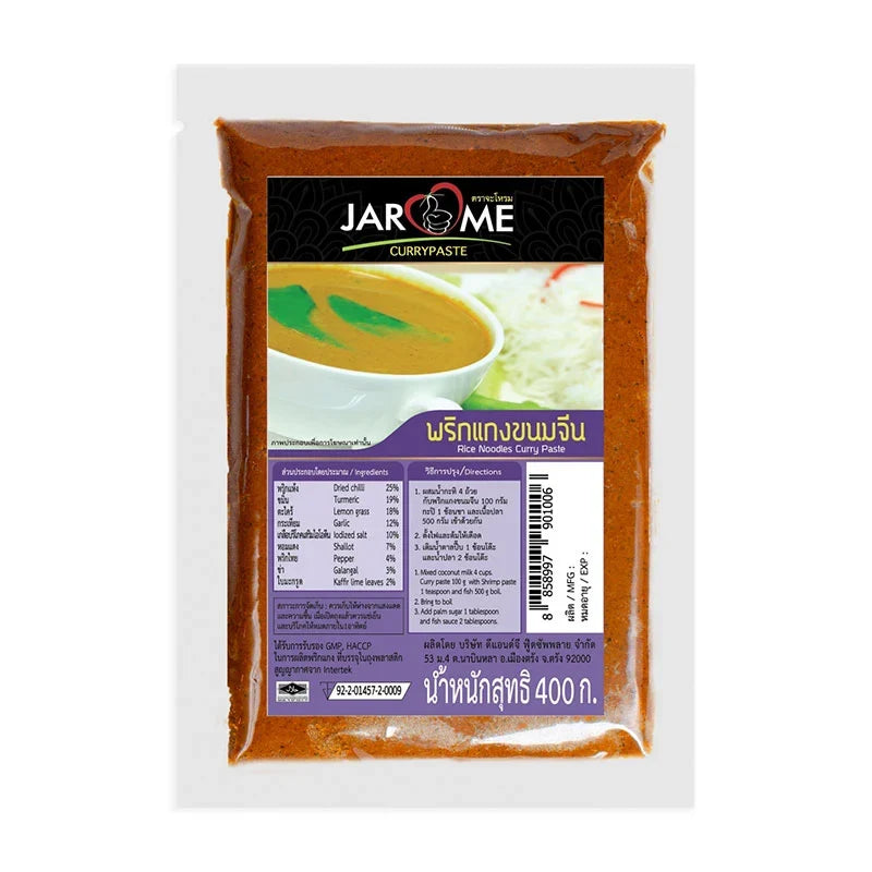 Jarome Rice Noodles Curry Paste 400g jar with label showing product name and brand, placed on a wooden surface.