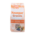 Familia Knusper Crunch Granola 500g in a clear plastic bag with golden clusters and oats, perfect for breakfast or snacking.