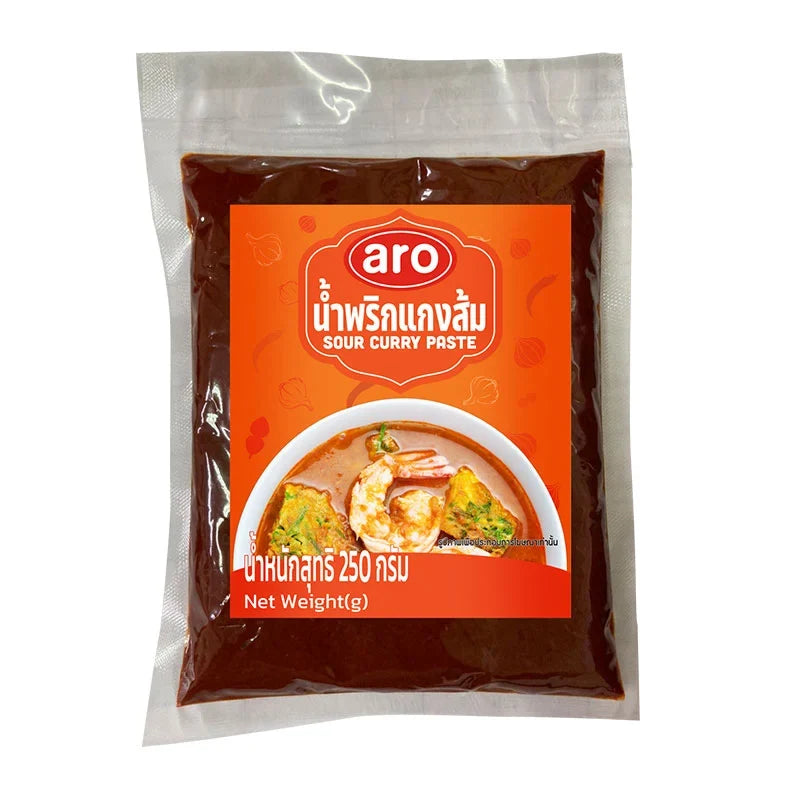 ARO Sour Curry Paste 250g in a clear jar, showcasing yellowish dry curry paste with a smooth texture, for Asian cooking.