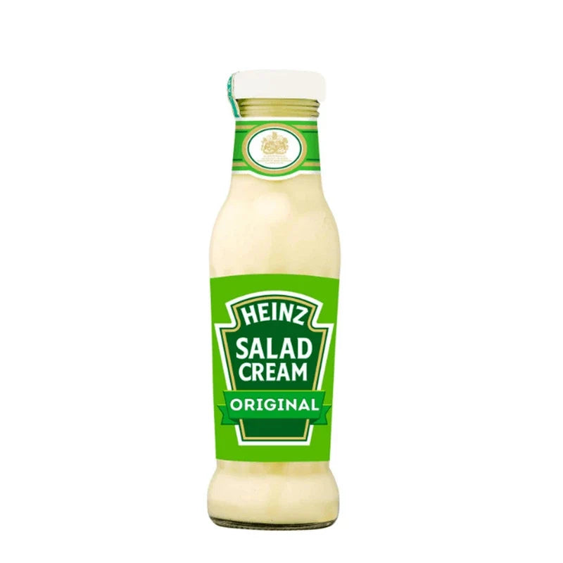 Heinz Salad Cream with rapeseed oil and vinegar, 285ml bottles, set of four, in a grocery product image.