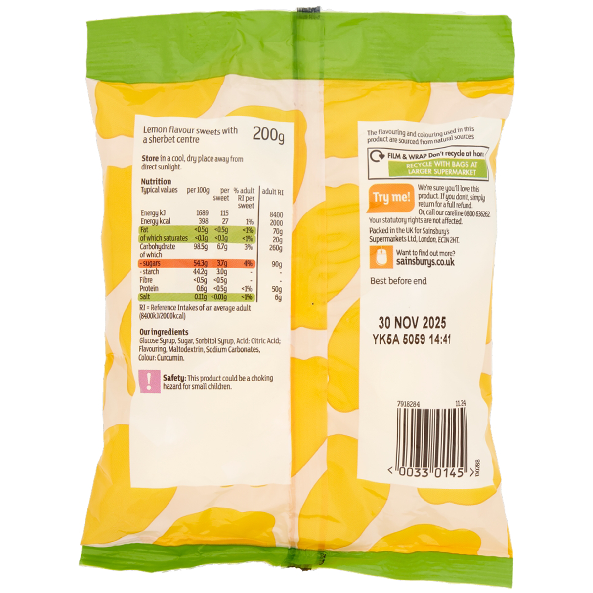 Sainsbury's Lemon Sherbet confectionery snacks in a colorful bag with lemon and sherbet candies spilling out.