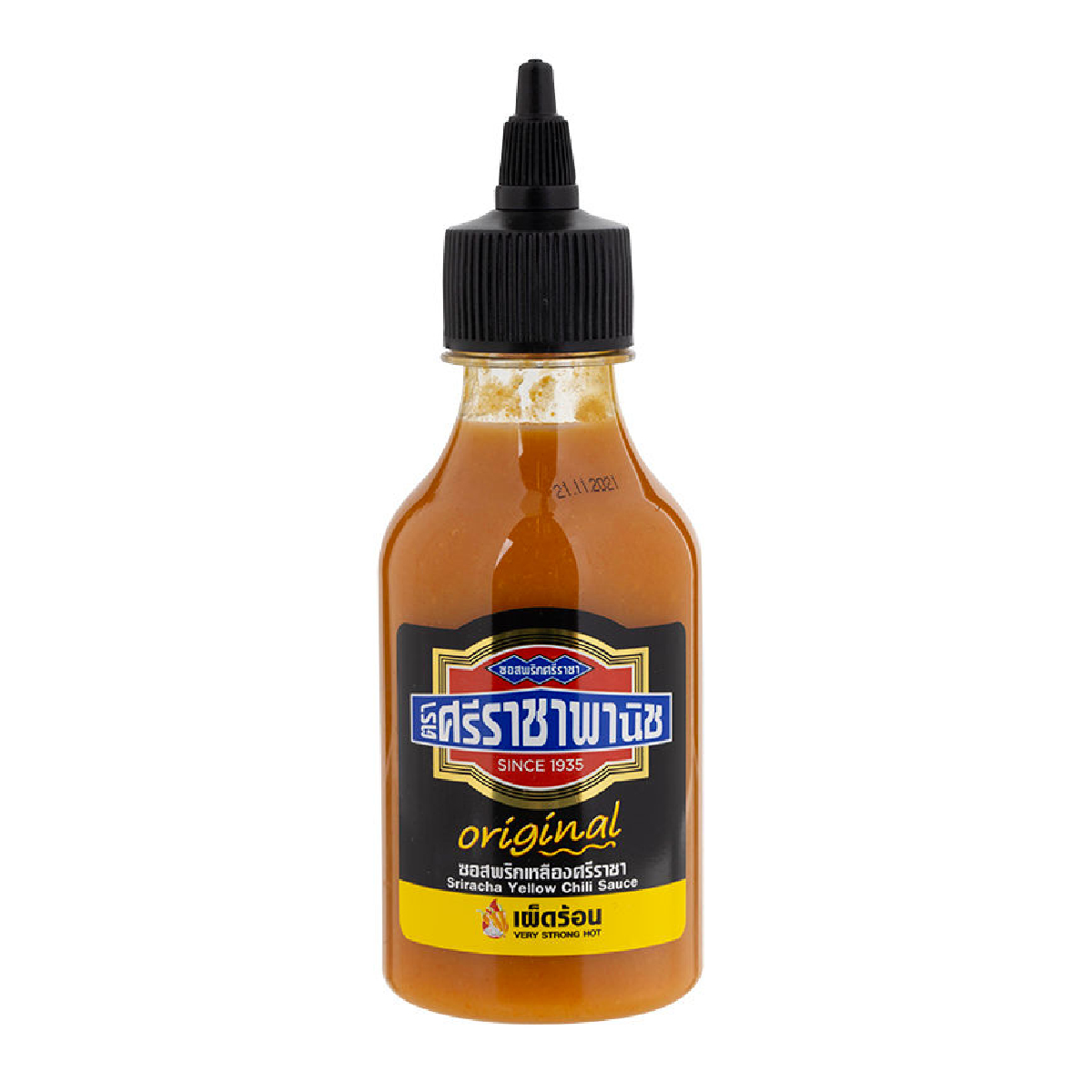 Sriraja Yellow Chilli Sauce bottle from grocery aisle, spicy condiment with bright yellow chili flavor in clear packaging