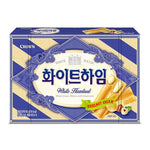 Crown White Heim Cream Wafer with Hazelnuts, 142g, showing a stack of crispy wafer snacks with hazelnut cream filling.