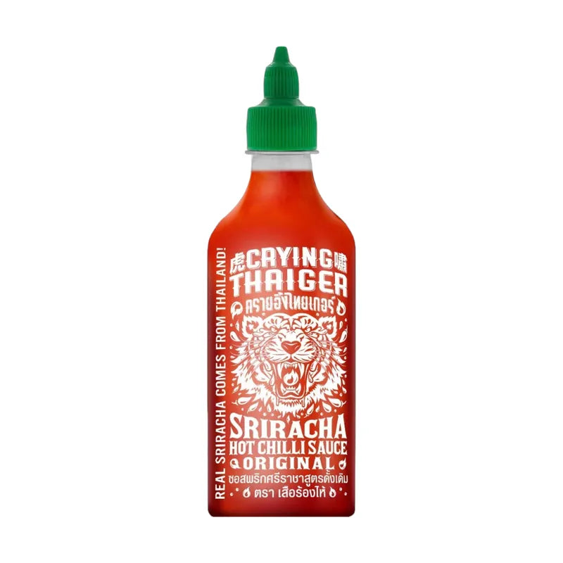 Crying Thaiger Sriracha Chili Sauce Tiger 484g bottle, spicy Thai hot sauce with red chili peppers and garlic on a white background.