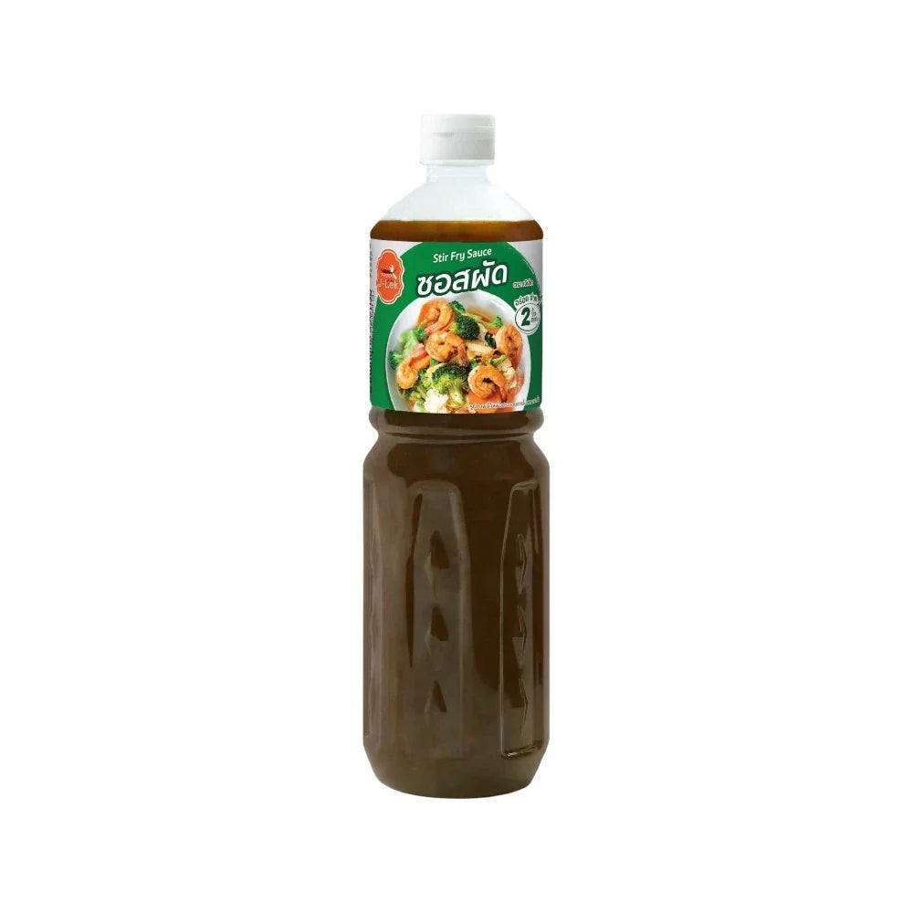 J-LEK Stir-Fry Sauce 550g in a jar, dry grocery product, with a dark, rich sauce inside, suitable for Asian-style stir-fry dishes.