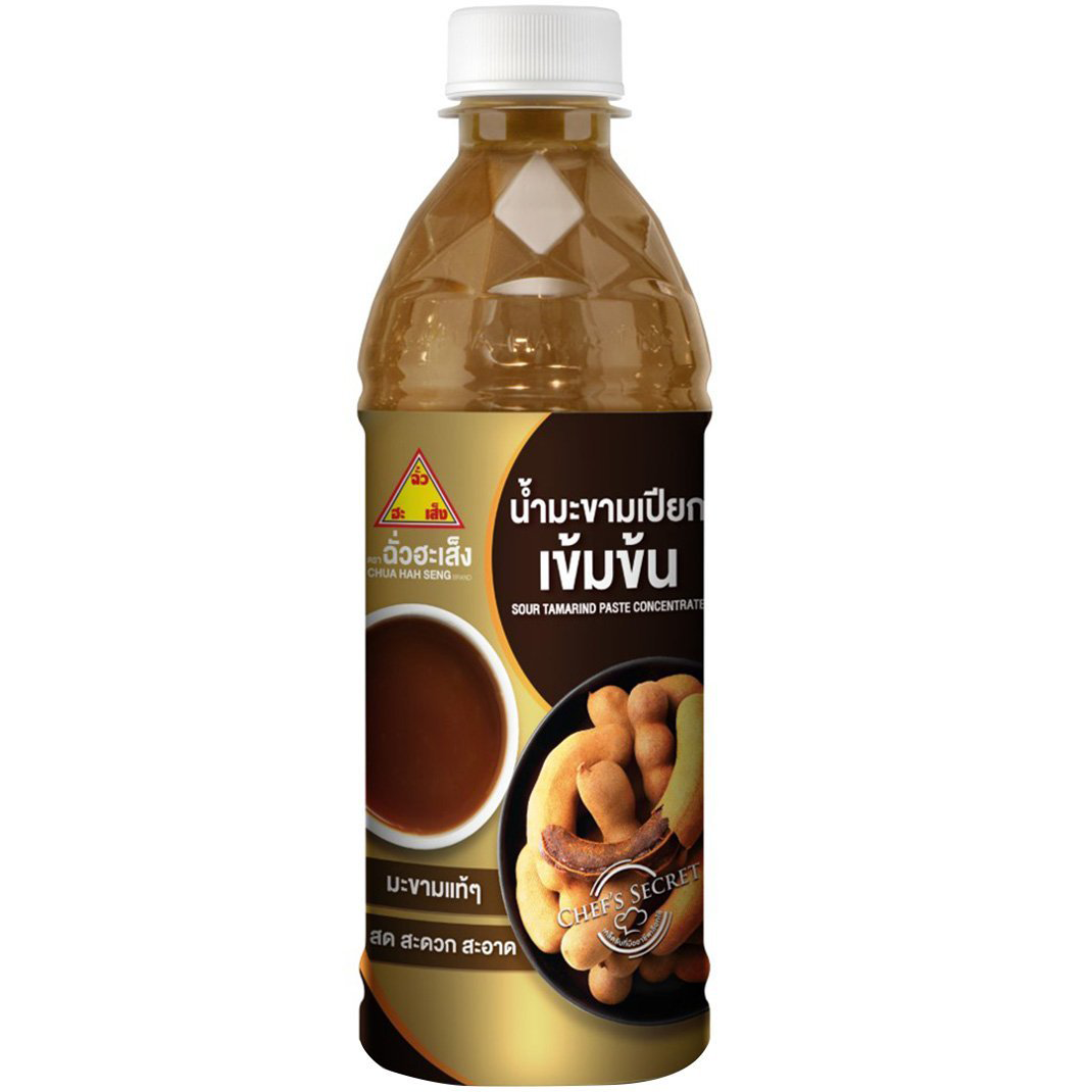 Chua Hah Seng Sour Tamarind Paste Concentrate in a jar, used for cooking and flavoring in Asian cuisine.