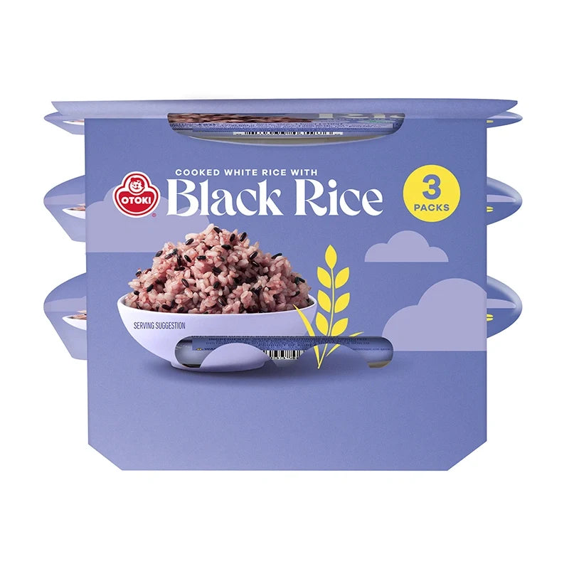 Otoki cooked black rice in 210g packs, displayed in a clear container with three packs visible, ideal for dry grocery shopping.