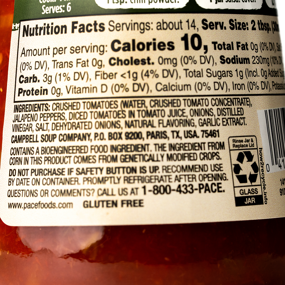 Pace Chunky Salsa Medium jar showing vibrant tomato, onion, and jalape��o ingredients in a clear glass jar.