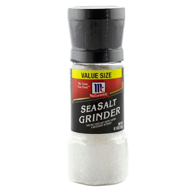 Mccormick Sea Salt 172g in a clear glass jar with a metal lid, showing coarse sea salt crystals inside.