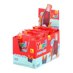 Yupi Gummy Ice Cola candies in 15g packs, colorful gummy snacks from YUPI, displayed in a clear bowl with packaging in the background.