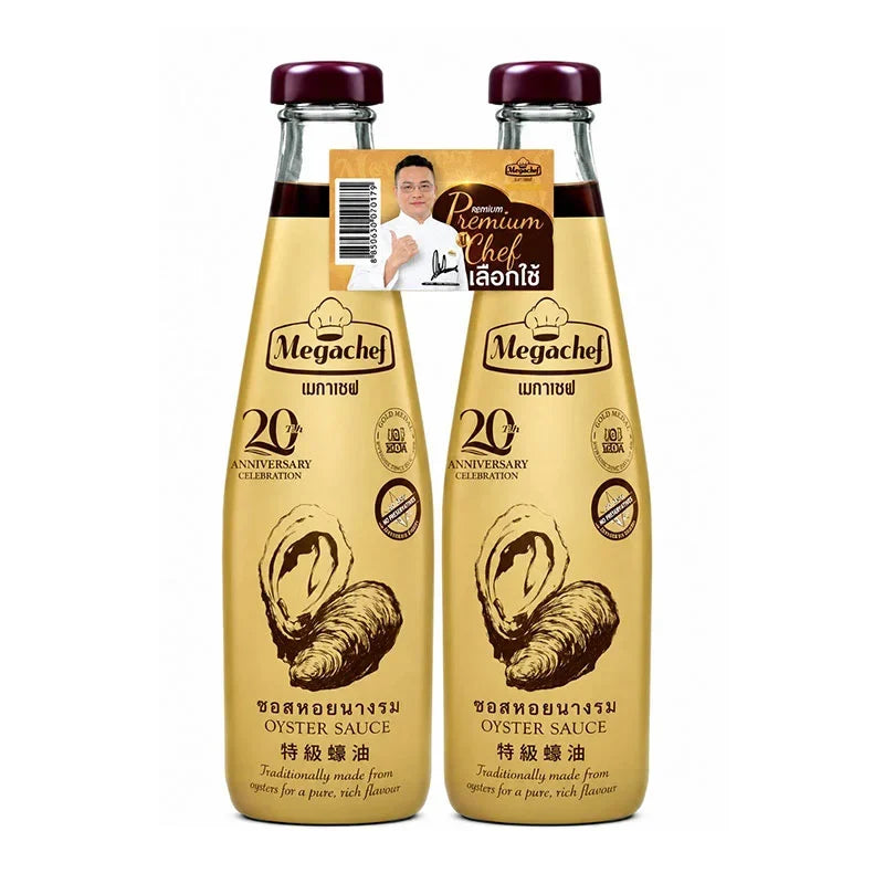 Two bottles of Megachef Oyster Sauce, 600g each, showing the dark sauce in clear bottles with red caps, for Asian cooking.
