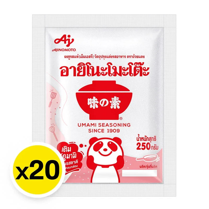 AJINOMOTO MSG 250g packets, dry grocery seasoning, displayed in a row with 20 packs on a shelf.